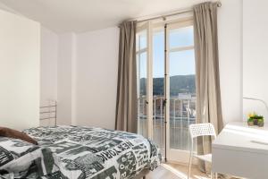 Postel nebo postele na pokoji v ubytování Hauzify I Apartament 4Winds