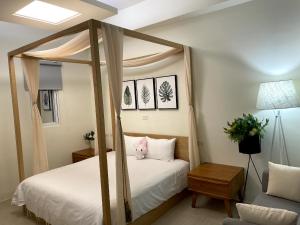 Letto o letti in una camera di Bloom B&B