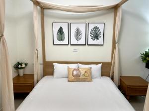 Letto o letti in una camera di Bloom B&B