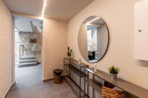 a hallway with a mirror and a fireplace at Double Room in ToledoRooms VistaPark in Toledo