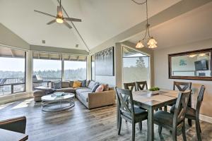 a living room with a table and a couch at Gorgeous Bend Condo with Community Hot Tub! in Bend