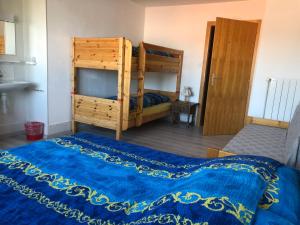 Postel nebo postele na pokoji v ubytování Chambres d'Hotes Le Passiflore