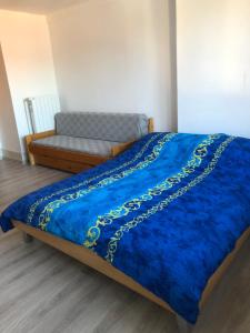 Postel nebo postele na pokoji v ubytování Chambres d'Hotes Le Passiflore