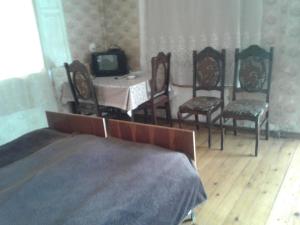 Postel nebo postele na pokoji v ubytování Levani's GuestHouse