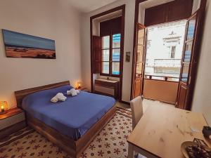 Postel nebo postele na pokoji v ubytování Alma Canaria Rooms