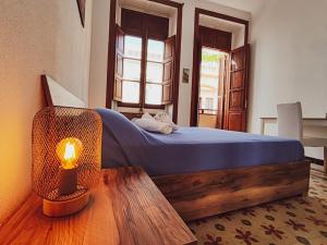 Postel nebo postele na pokoji v ubytování Alma Canaria Rooms