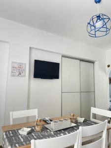 TV a/nebo společenská místnost v ubytování Marena 1