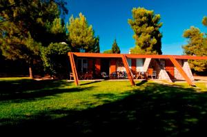 A garden outside Seafront Villa Aggeliki