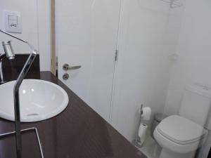 Ein Badezimmer in der Unterkunft Apartamento Lindo Central