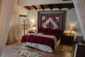 Un pat sau paturi într-o cameră la Pousada Lanai Gramado
