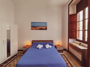 Postel nebo postele na pokoji v ubytování Alma Canaria Rooms