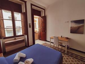 Postel nebo postele na pokoji v ubytování Alma Canaria Rooms