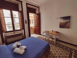 Postel nebo postele na pokoji v ubytování Alma Canaria Rooms