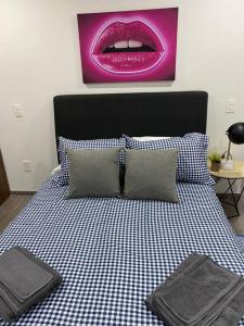 En eller flere senge i et værelse på NUEVO, Moderno departamento en la zona de SANTA FE