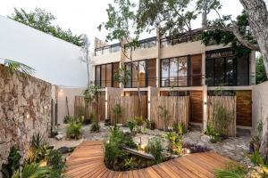 Un jardín fuera de BIT Tulum Villas