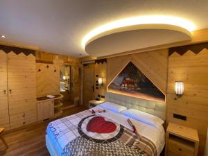 Postel nebo postele na pokoji v ubytování Hotel Laurino