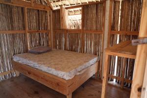 Säng eller sängar i ett rum på Cabañas Tubasenika