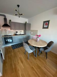Kuchyňa alebo kuchynka v ubytovaní Apartman Pepper