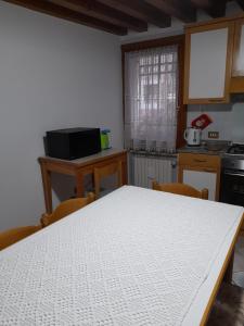 Kuchyňa alebo kuchynka v ubytovaní come a casa tua dietro piazza San Marco