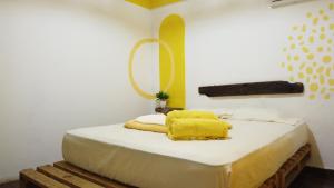 Postel nebo postele na pokoji v ubytování Acuarela Hostal