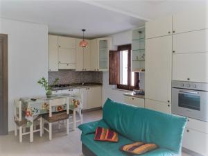 Kuchyň nebo kuchyňský kout v ubytování Casa Marietta