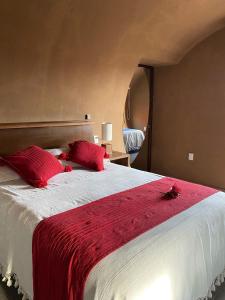 מיטה או מיטות בחדר ב-Casa Naiyari