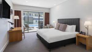 Rydges Resort Hunter Valley客房内的一张或多张床位