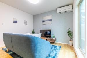Telewizja i/lub zestaw kina domowego w obiekcie Pau-lele天下茶屋東