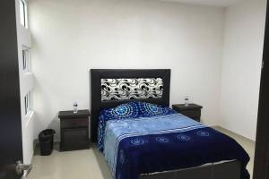 Postel nebo postele na pokoji v ubytování Casa minimalista tranquila y acogedora, con garage
