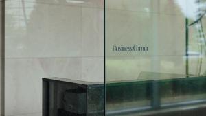 a glass window with the words jurassic center on it at LOTTE City Hotel Gimpo Airport in Seoul