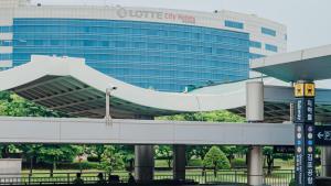 a large building with a slide in front of it at LOTTE City Hotel Gimpo Airport in Seoul