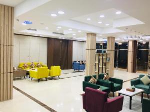 Royal Land Deluxe Suites رويال لاند للأجنحة الفاخرة的休息区