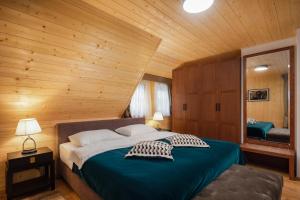 Cama o camas de una habitación en Fenomen Plitvice Gornja Jezera