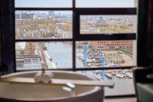 Nespecifikovaný výhled na destinaci Amsterdam nebo výhled na město při pohledu z hotelu