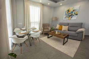 Posedenie v ubytovaní Apartamentos Ribera 19