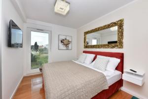 Posteľ alebo postele v izbe v ubytovaní MM Luxury Apartments GOLD & RUBIN