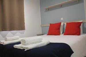 Cama o camas de una habitación en Camping La Fundicion