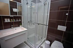 Koupelna v ubytování Hotel Herceg