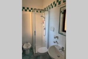 Ванная комната в Pelosa - Capo Falcone Excellent Apartment