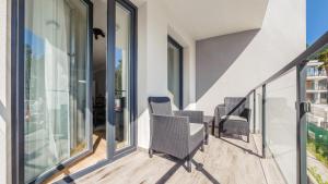 Balkon lub taras w obiekcie Apartamenty Sun & Snow Baltic Apartments z basenem