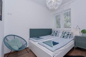 Posteľ alebo postele v izbe v ubytovaní Nightingale Luxury Apartment