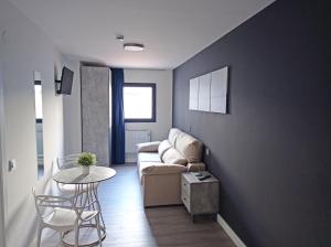 Posedenie v ubytovaní Apartamentos Hi Apartaments Santander 3000