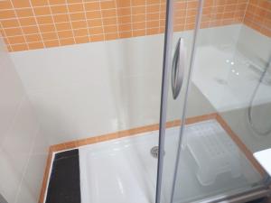 Kúpeľňa v ubytovaní Apartamentos Hi Apartaments Santander 3000