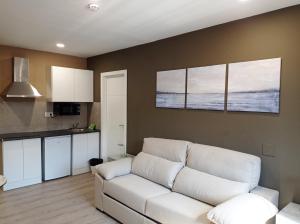 Kuchyňa alebo kuchynka v ubytovaní Apartamentos Hi Apartaments Santander 3000