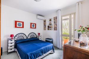 A bed or beds in a room at House&Villas - La casa delle Stelle Még 37 kép
