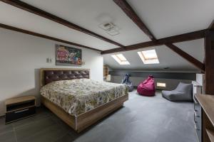 Ένα ή περισσότερα κρεβάτια σε δωμάτιο στο Apart Hotel Fusion