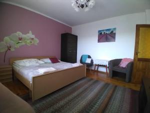 Posteľ alebo postele v izbe v ubytovaní Przy Starej Lipie
