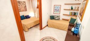 Posteľ alebo postele v izbe v ubytovaní Ca' Marco Apartment