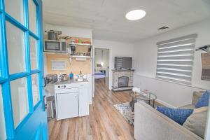 a room with a kitchen and a living room at Fairway Paradise tiny home in Lancaster