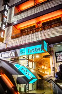 a hotel sign in front of a building at Hotel Vas Vitoria AutoCheckIn in Vitoria-Gasteiz